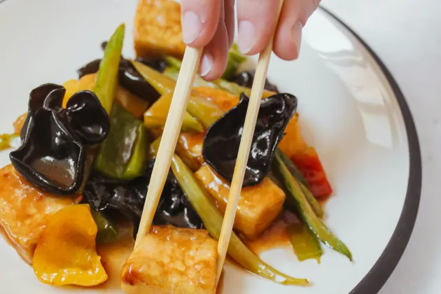tofu eaten with chopsticks
